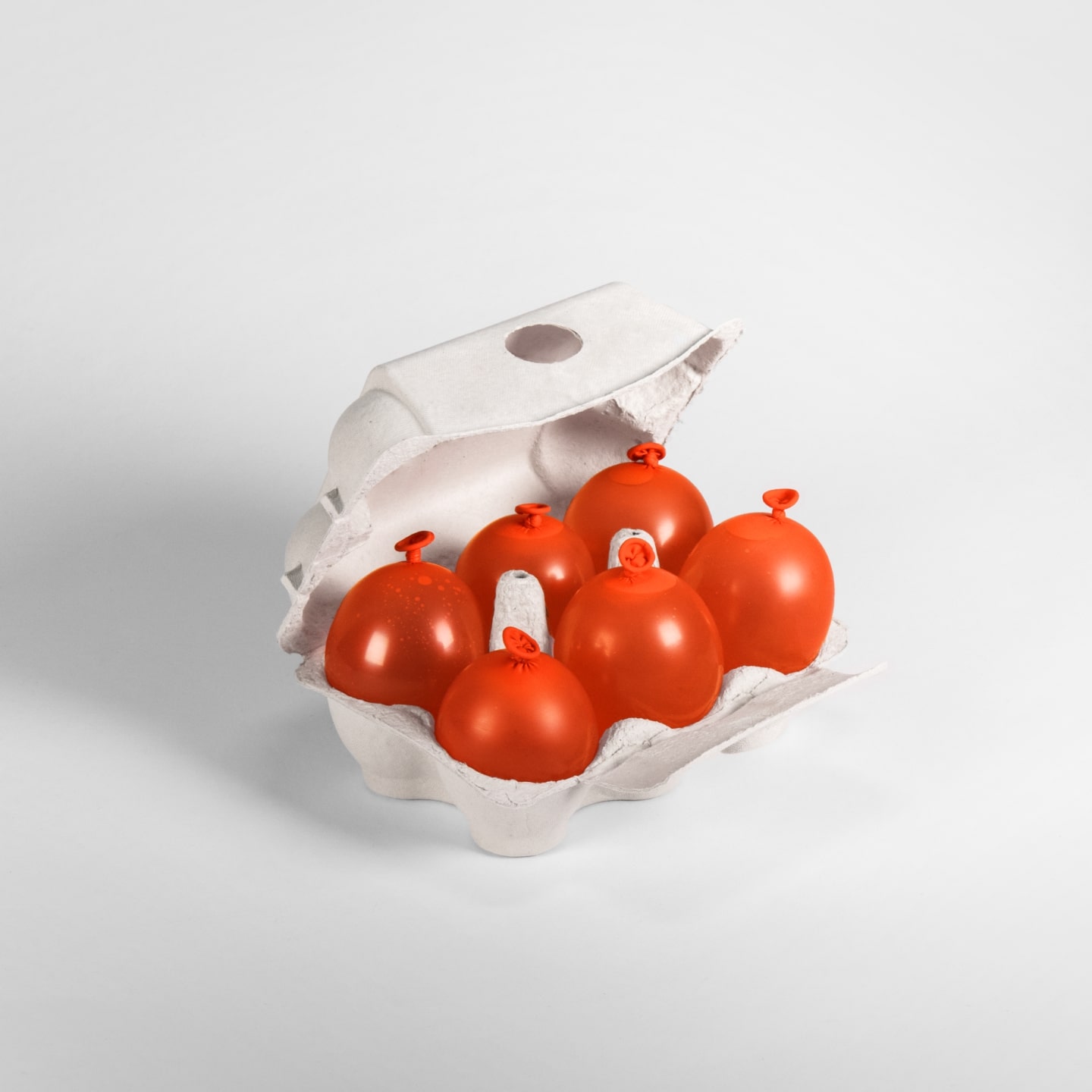 An egg case filled with ballon eggs